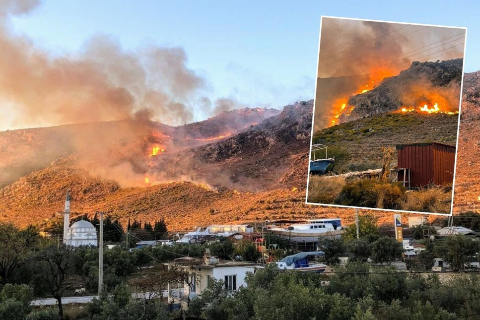 Marmaris'te taşlık ve makilik alanda çıkan yangın, tekne atölyelerini tehdit ediyor