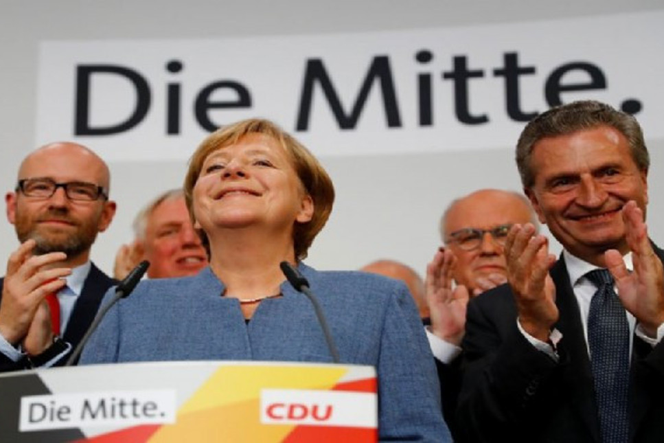 Almanya'da Merkel kazandı ama işi çok zor