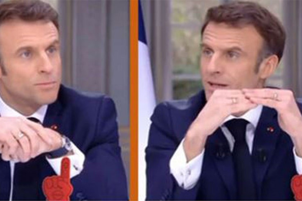 Ekonomi sorusunu duyan Macron saatini çıkardı